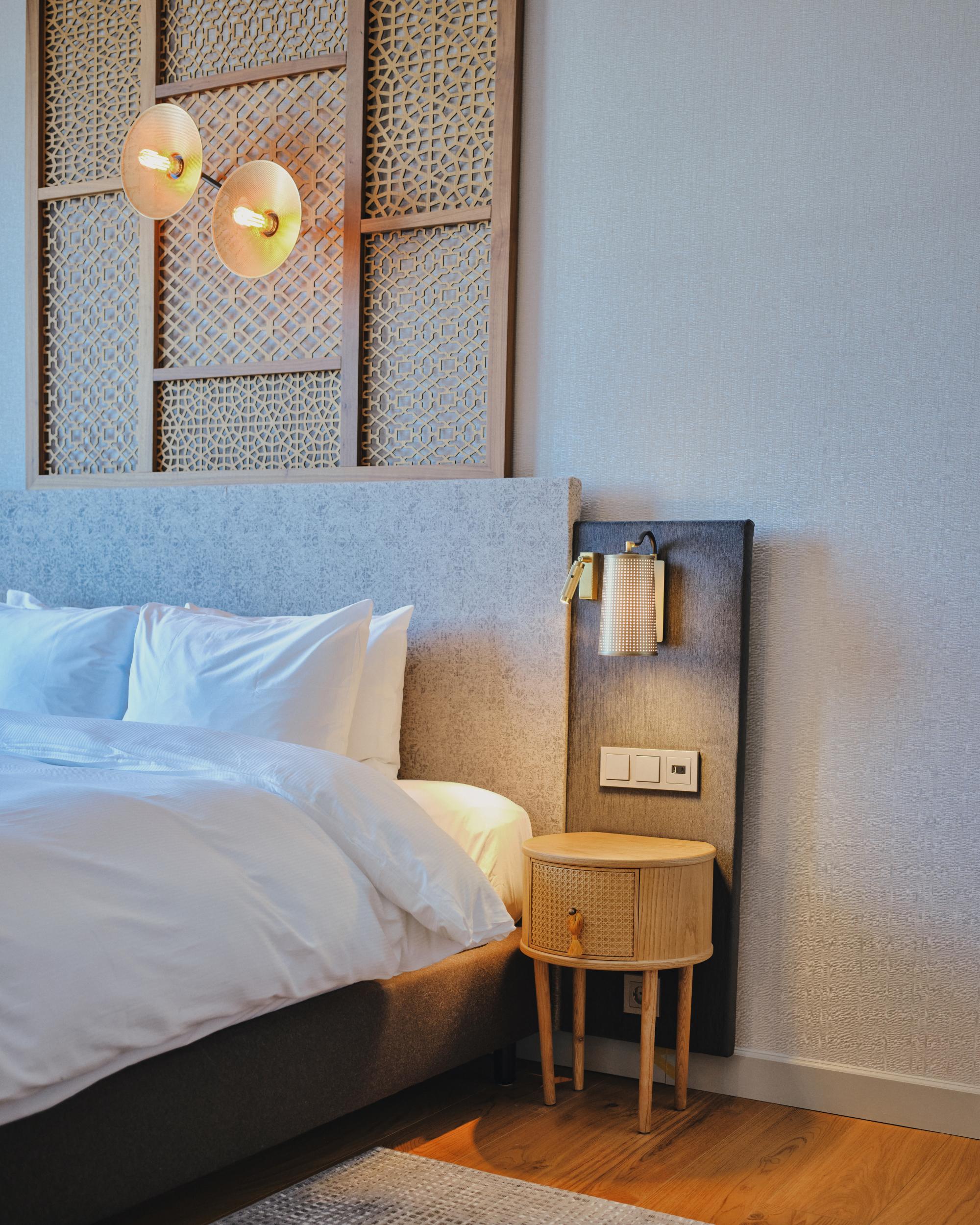 Spacious King Bed Suite with lounge area and sofa bed at voco The Hague